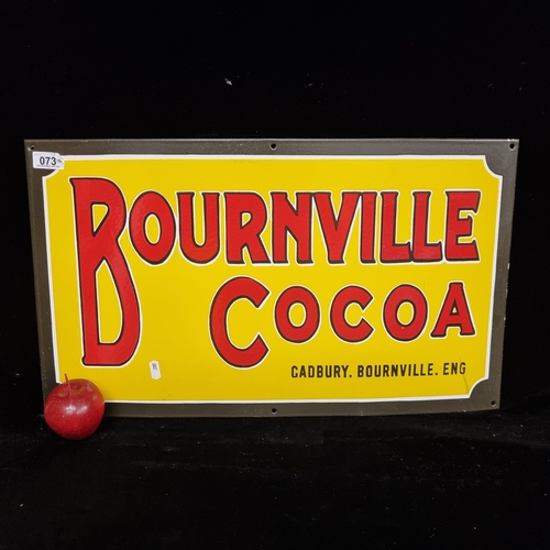 73 - A good sized enamel advertising sign for Bournville Cocoa in bright yellows and reds. In great condi... 