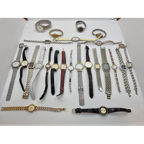 778 - 24 men's and women's wristwatches of various materials and styles including silver and gold tones an... 