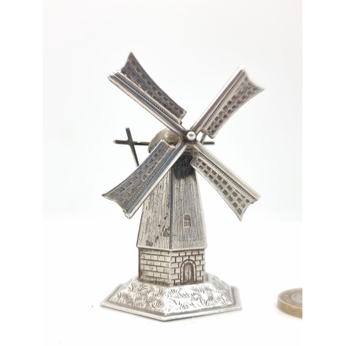 780 - A very handsome vintage example of a windmill in Continental silver (with Continental hallmarks), wi... 