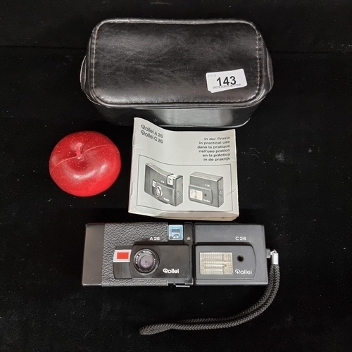 143 - A handsome vintage Rollei photography set comprising of the Rollei A26 compact camera and C26 flash ... 
