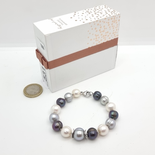 531 - A very pretty NATURAL PEARL bracelet by Tipperary crystal. This example is in as new condition and c... 