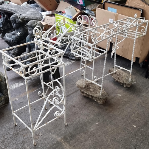 555 - Three vintage, cast iron plant tables, for use in the garden or conservatory. With beautiful scroll ... 