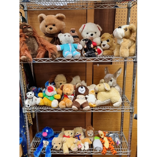 567 - A large collection of plush toys including a Wallace & Gromit Beanies example and Sesame Street's Be... 