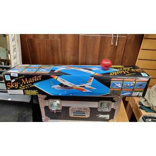 571 - A Sky Master electric R/C airplane. Length 23.6 inches and wingspan 33.9 inches. In original box, br... 