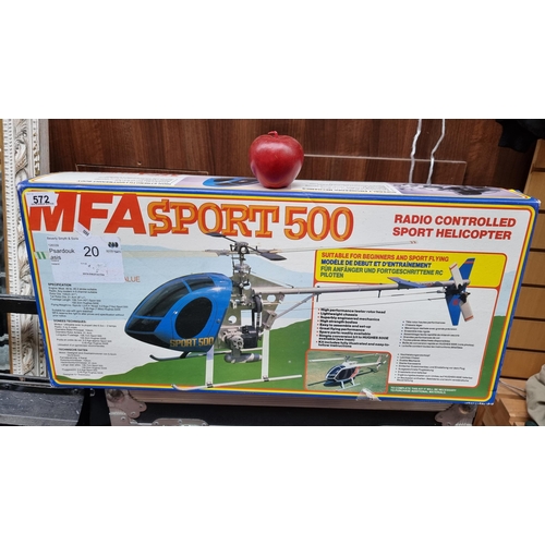 572 - A MFA sport 500 radio controlled helicopter. Length 42 inches. Brand new in original box never been ... 