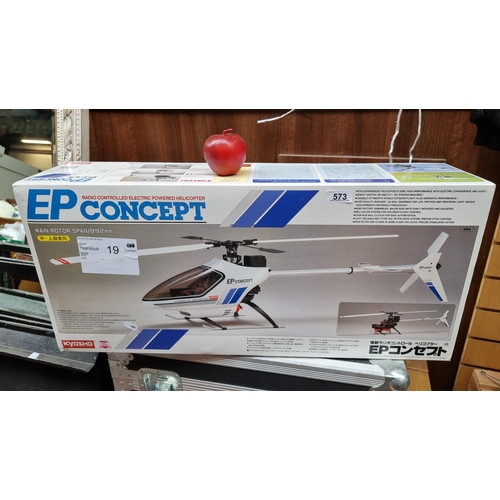 573 - A Radio controlled EP Concept helicopter made by Kyosho. Roter span 80cm and body size 32.7 inches. ... 