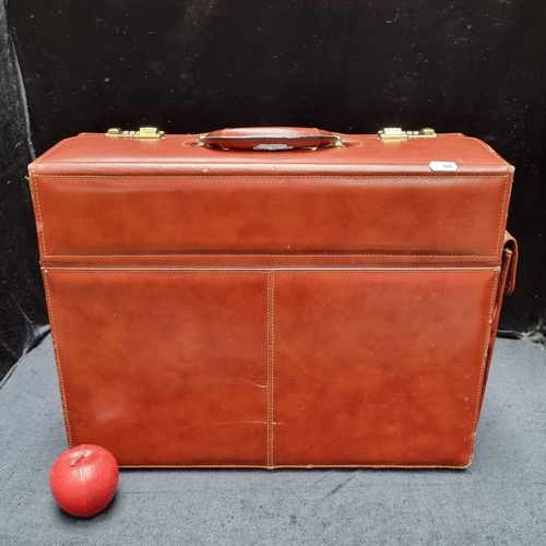 575 - A very handsome Antler brown Antler briefcase with combination lock, saddle stitch detailing and ple... 