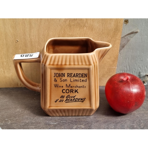 589 - A lovely rare Arklow Pottery branded jug for John Rearden Wine Merchants Cork reading 