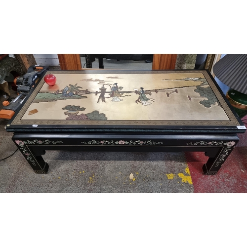 707 - STAR LOT : A beautiful long Chinese coffee table with heavily carved and painted detailing in tradit... 