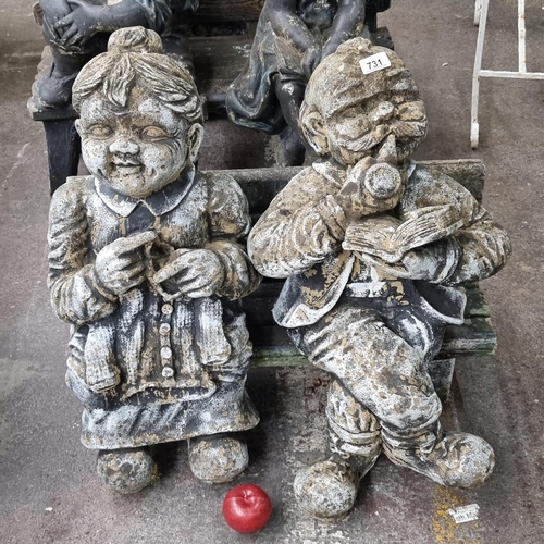 731 - A delightful garden ornament of a elderly couple sitting on a bench. COMES IN 3 PIECES AND VERY HEAV... 