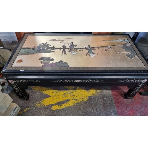 707 - STAR LOT : A beautiful long Chinese coffee table with heavily carved and painted detailing in tradit... 