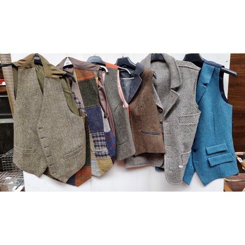 251 - A selection of six exquisite Irish made waist coats in tweed, herringbone and woven wool including a... 