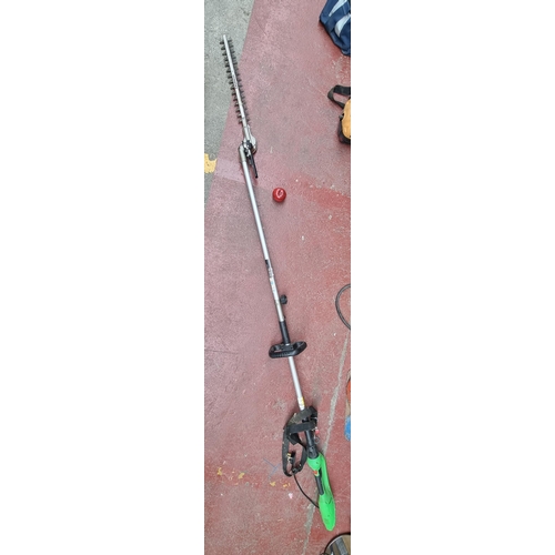 258 - A very tall long reach hedge trimmer approximately 260cm in length with a Laserout blade with trimmi... 