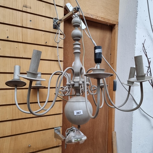 267 - An eight branch metal chandelier with lovely curved bolster stem and a textured paint effect finish ... 