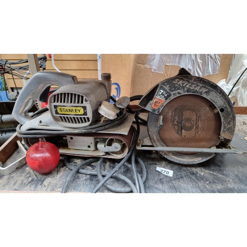 270 - Two electric tools including a Stanley electric sander and a Skilsaw 7 1/4  inch circular saw. Both ... 