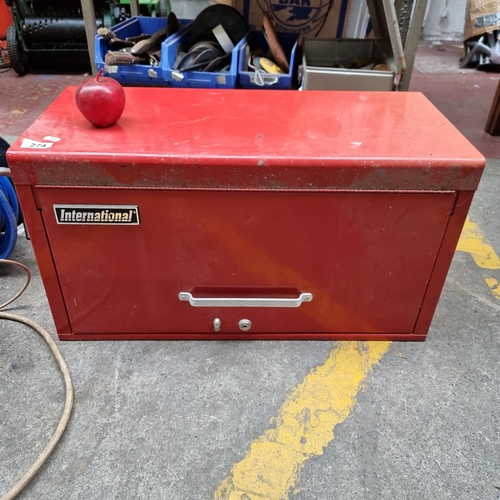 274 - A very large and heavy International lockable metal tool case or locker with a bright red metal fini... 