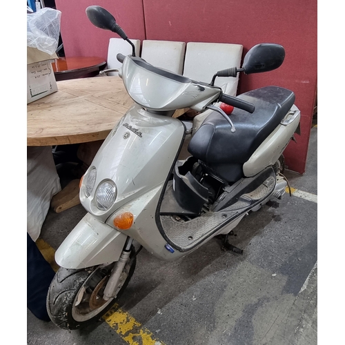 290 - A Yamaha 100 Neo Electric Start Moped. In a warm grey finish with kickstand, review mirrors and key.... 