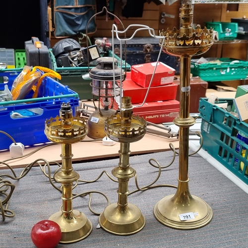 291 - Three lovely brass table lamps with intricately pieced rims, one very tall and two matching smaller ... 