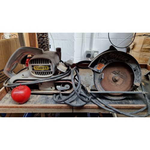 270 - Two electric tools including a Stanley electric sander and a Skilsaw 7 1/4  inch circular saw. Both ... 