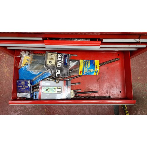 274 - A very large and heavy International lockable metal tool case or locker with a bright red metal fini... 