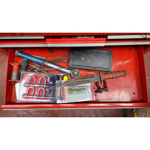 274 - A very large and heavy International lockable metal tool case or locker with a bright red metal fini... 