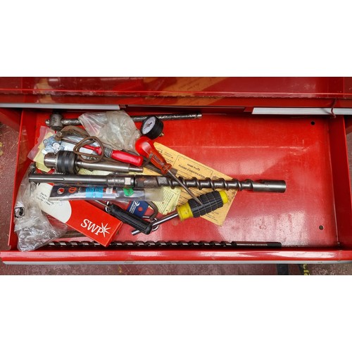 274 - A very large and heavy International lockable metal tool case or locker with a bright red metal fini... 