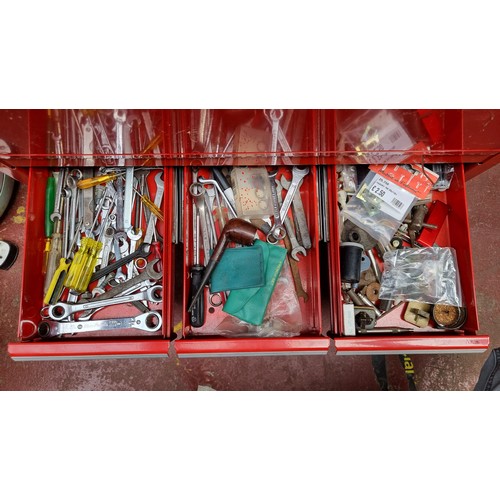 274 - A very large and heavy International lockable metal tool case or locker with a bright red metal fini... 