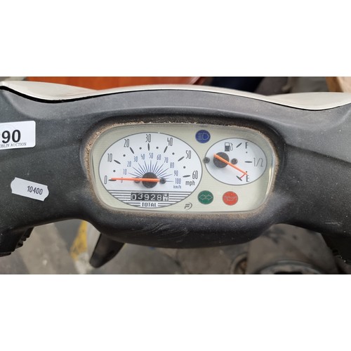 290 - A Yamaha 100 Neo Electric Start Moped. In a warm grey finish with kickstand, review mirrors and key.... 