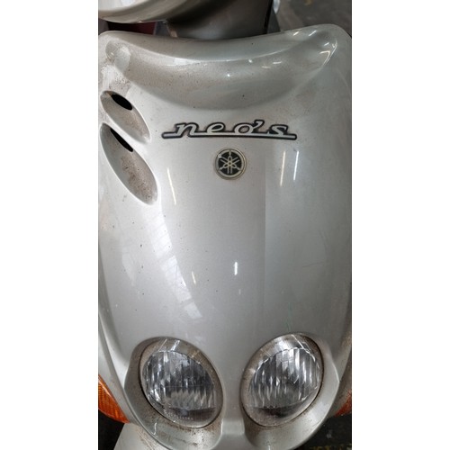 290 - A Yamaha 100 Neo Electric Start Moped. In a warm grey finish with kickstand, review mirrors and key.... 