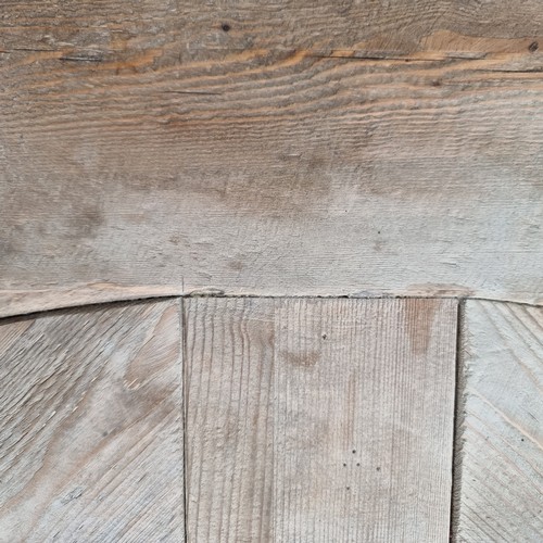 289 - Star lot: A large very heavy solid oak round dining table with contrasting figure to the top and a s... 