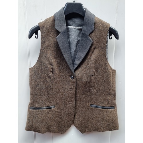 251 - A selection of six exquisite Irish made waist coats in tweed, herringbone and woven wool including a... 