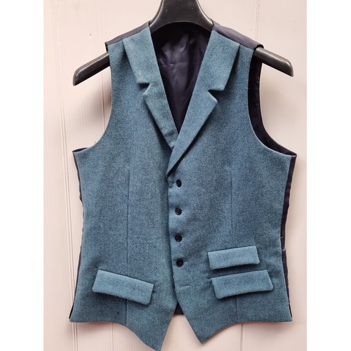 251 - A selection of six exquisite Irish made waist coats in tweed, herringbone and woven wool including a... 