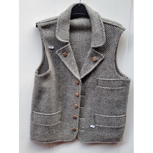 251 - A selection of six exquisite Irish made waist coats in tweed, herringbone and woven wool including a... 