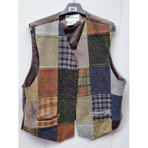 251 - A selection of six exquisite Irish made waist coats in tweed, herringbone and woven wool including a... 