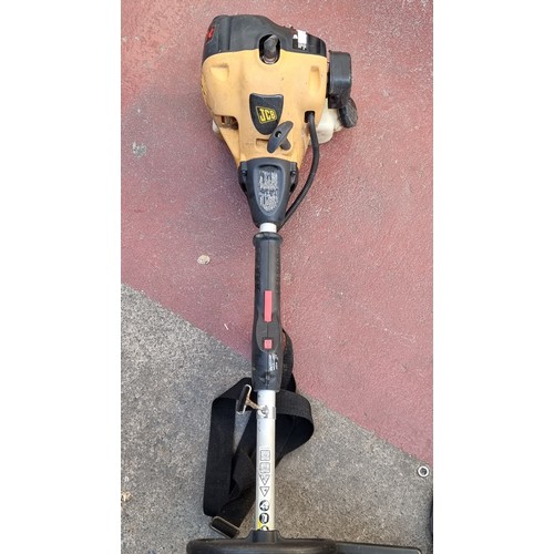 259 - A JCB grass strimmer with petrol engine in good working order.