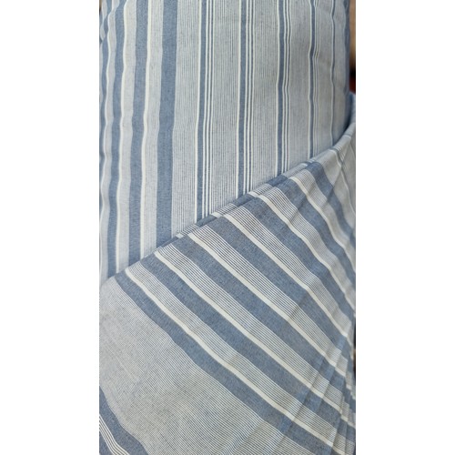 278 - A very large bolt of pinstriped blue fabric, in a cotton blend.