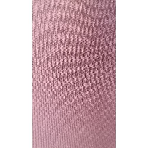 285 - A large bolt of lilac purple fabric in a plain finish