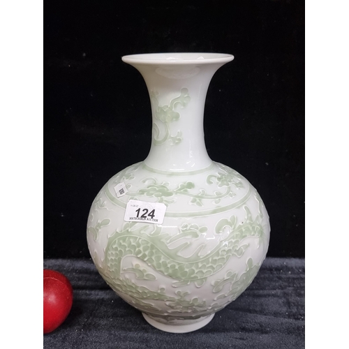 124 - A lovely large celadon and cream glazed Chinese vase, depicting a sinuous dragon with slip trailing ... 