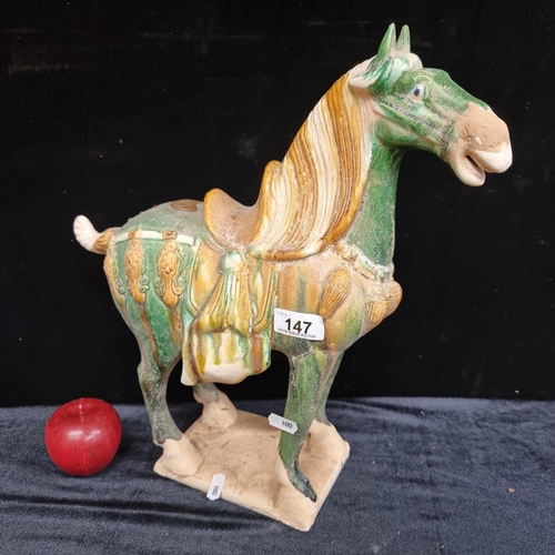 147 - A beautiful Chinese ceramic horse modelled after the Tang dynasty examples and glazed in the customa... 