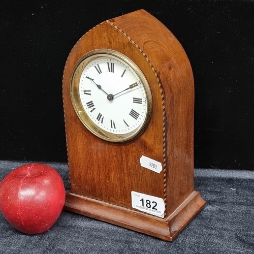 182 - A 1920's mantel lancet clock with a lovely boxwood case featuring banded edging, and standing on fou... 