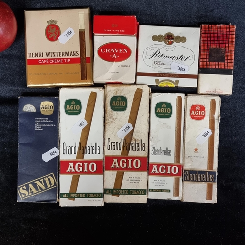 183 - A selection of nine vintage full packets of cigarettes and cigars. Including two 5-packs of AGIO Gra... 