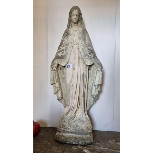 630 - A very heavy reconstituted stone garden ornament of the serene Virgin Mary.