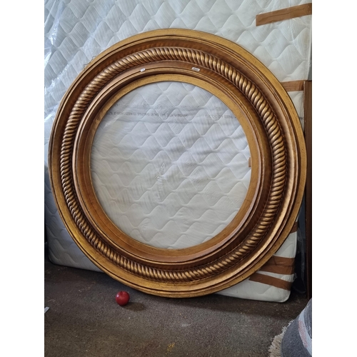 652 - A magnificent circular porthole style mirror frame with rope twist border. A huge example and a wond... 