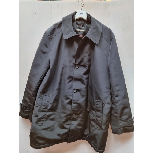 A nice black water resistant coat with fleece inner lining by Kenneth Cole, size XL. In VGC