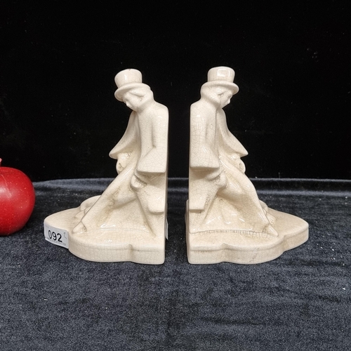 92 - A great pair of antique ceramic book ends in the form of a reclining Victorian gentleman. Lovely cra... 