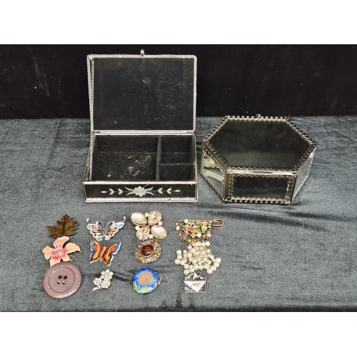 771 - Two mirrored jewellery boxes, one filled with fantastic costume jewellery and enamelled brooches. Ve... 