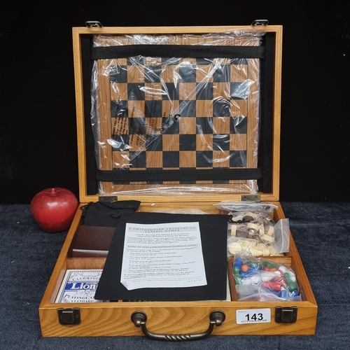 143 - A brand new games compendium titled Smithsonian Treasury of Classic Games including chess and checke... 