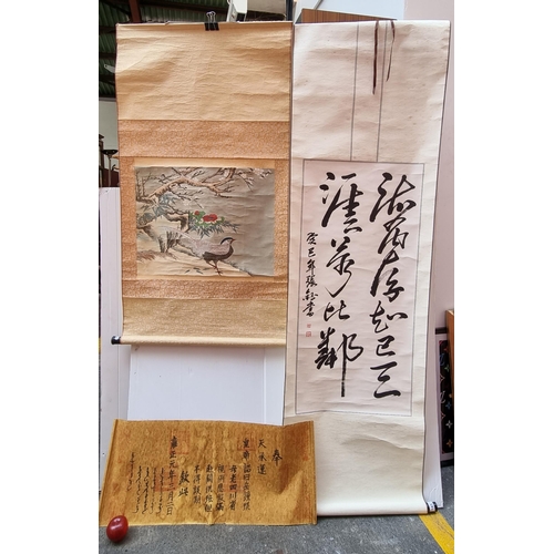 145 - A selection of three scrolls, including an antique governmental decree. As well as an antique Chines... 