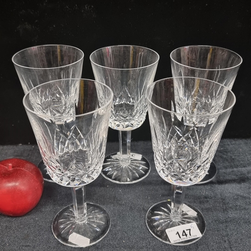 147 - A wonderful collection of five Waterford Crystal wine glasses in the Lismore pattern. Heavy examples... 