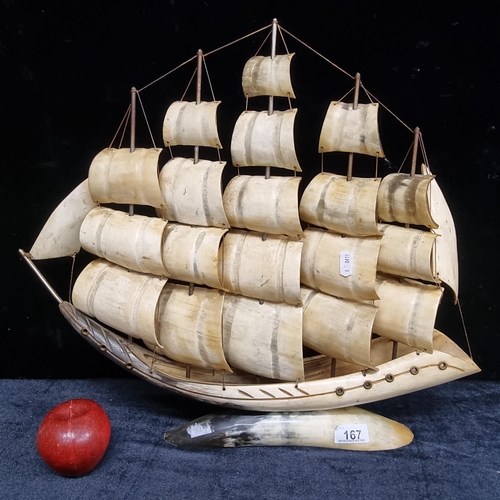 167 - A complete vintage model ship constructed entirely out of horn, with steel masts and woven thread ri... 